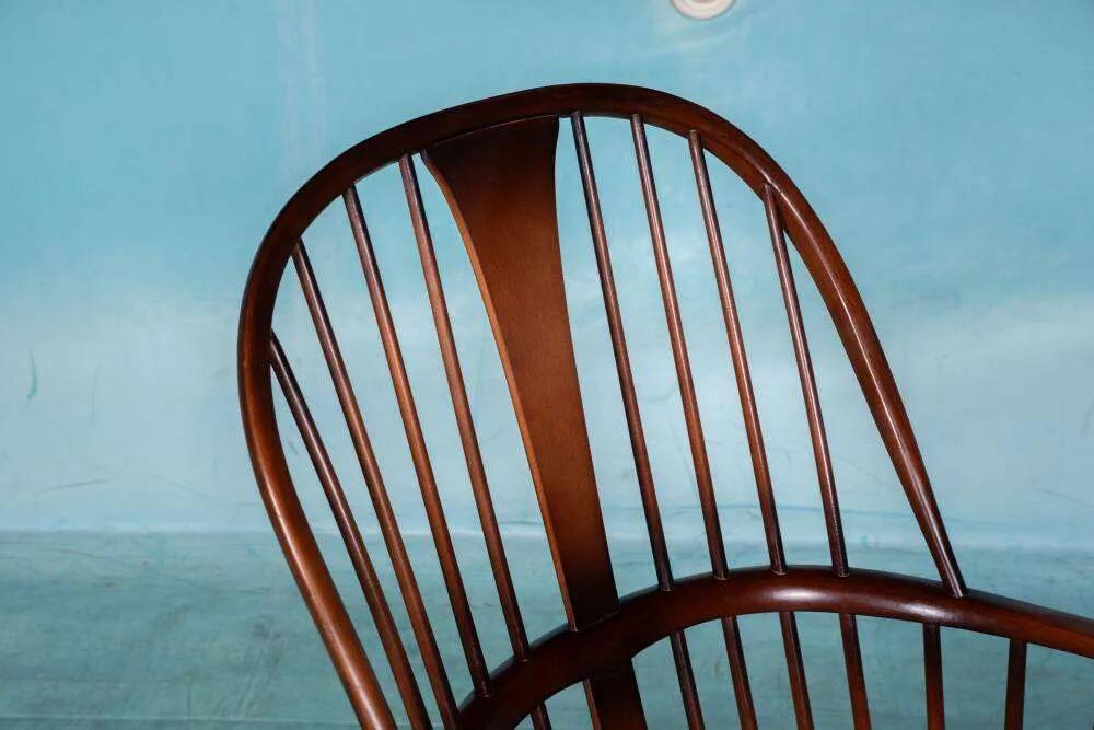 Ercol model 472 fireplace chair from the 1960s in beech.