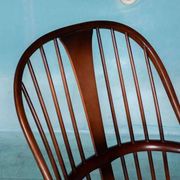 Ercol model 472 fireplace chair from the 1960s in beech.