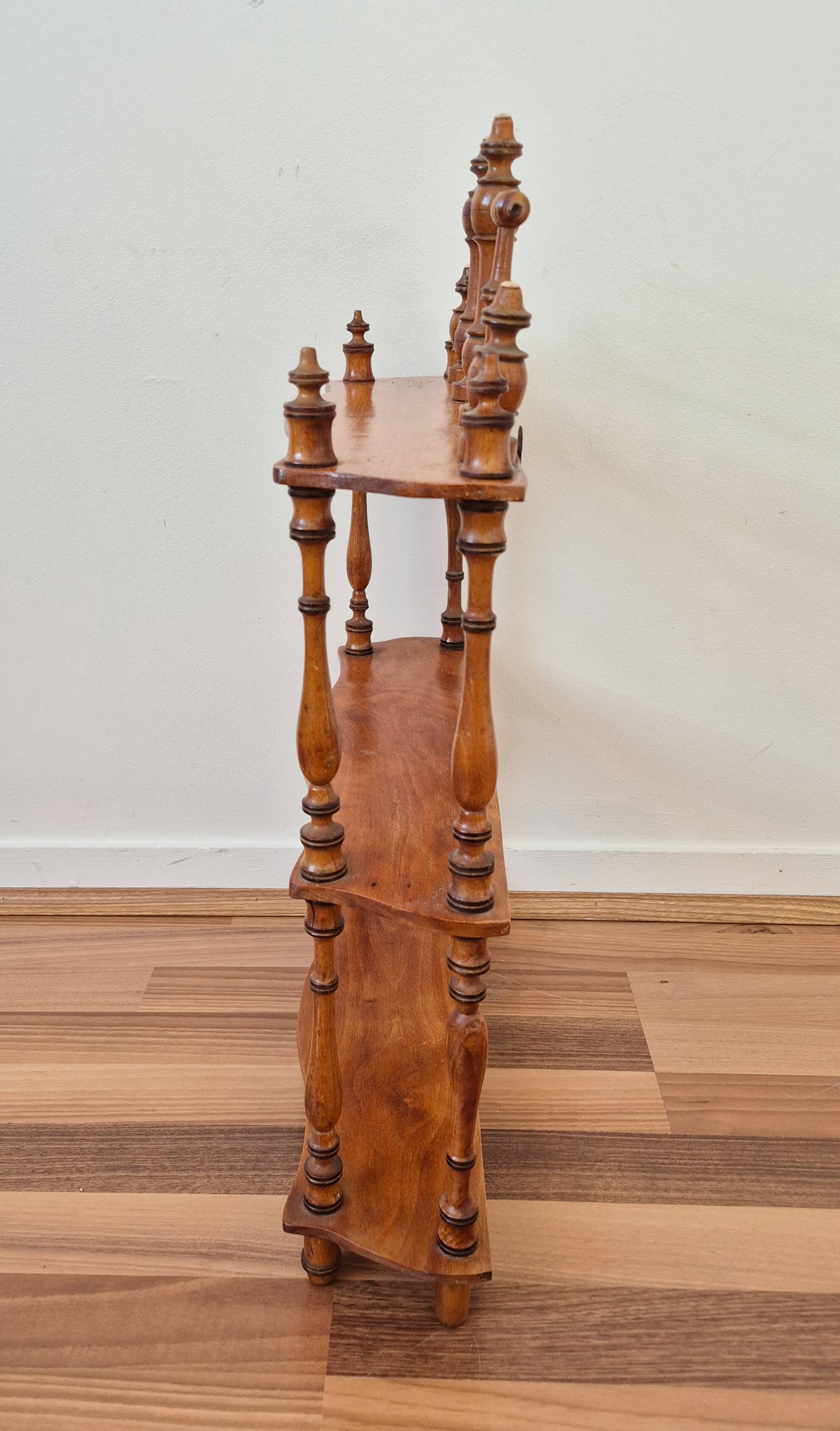 Waxed turned wooden shelf