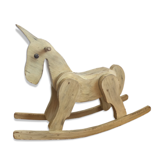 At Unicorn head, solid oak rocking horse