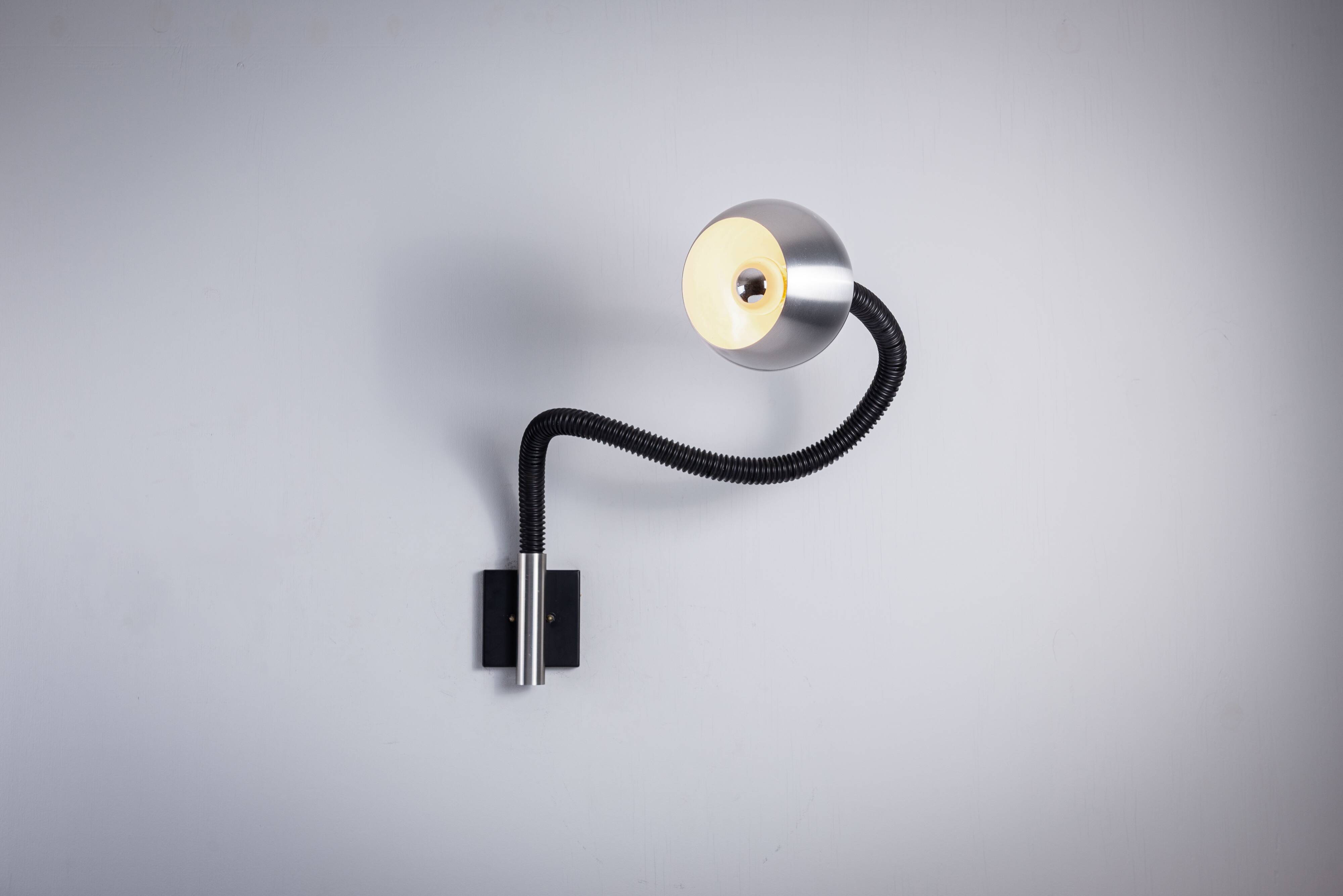 Martine Le Forestier ‘‘Serpent’’ wall lamp for Raak Amsterdam 1968