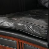 Black cowhide leather and wooden Art Deco design armchair