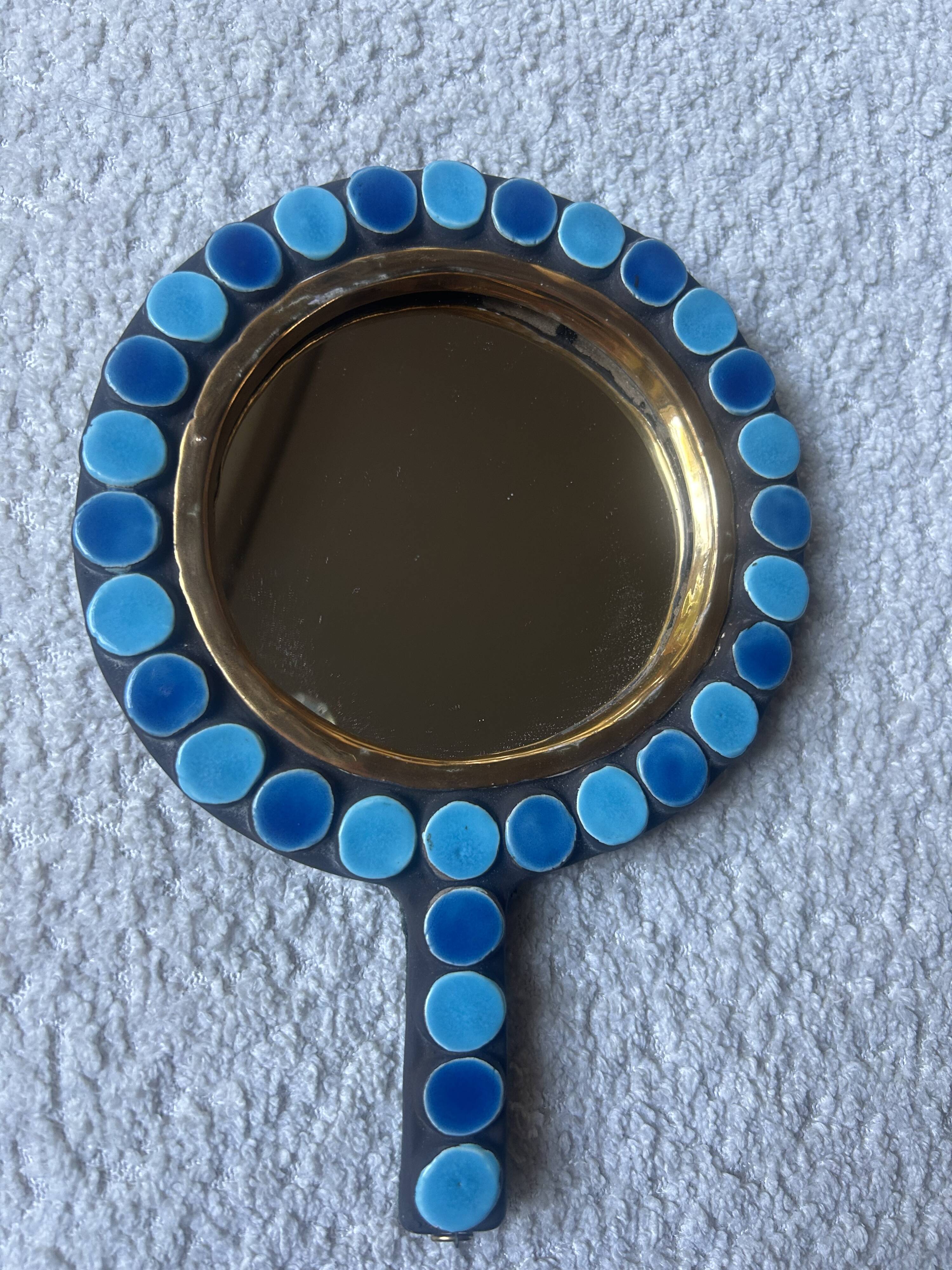 Mithé Espelt handheld mirror
