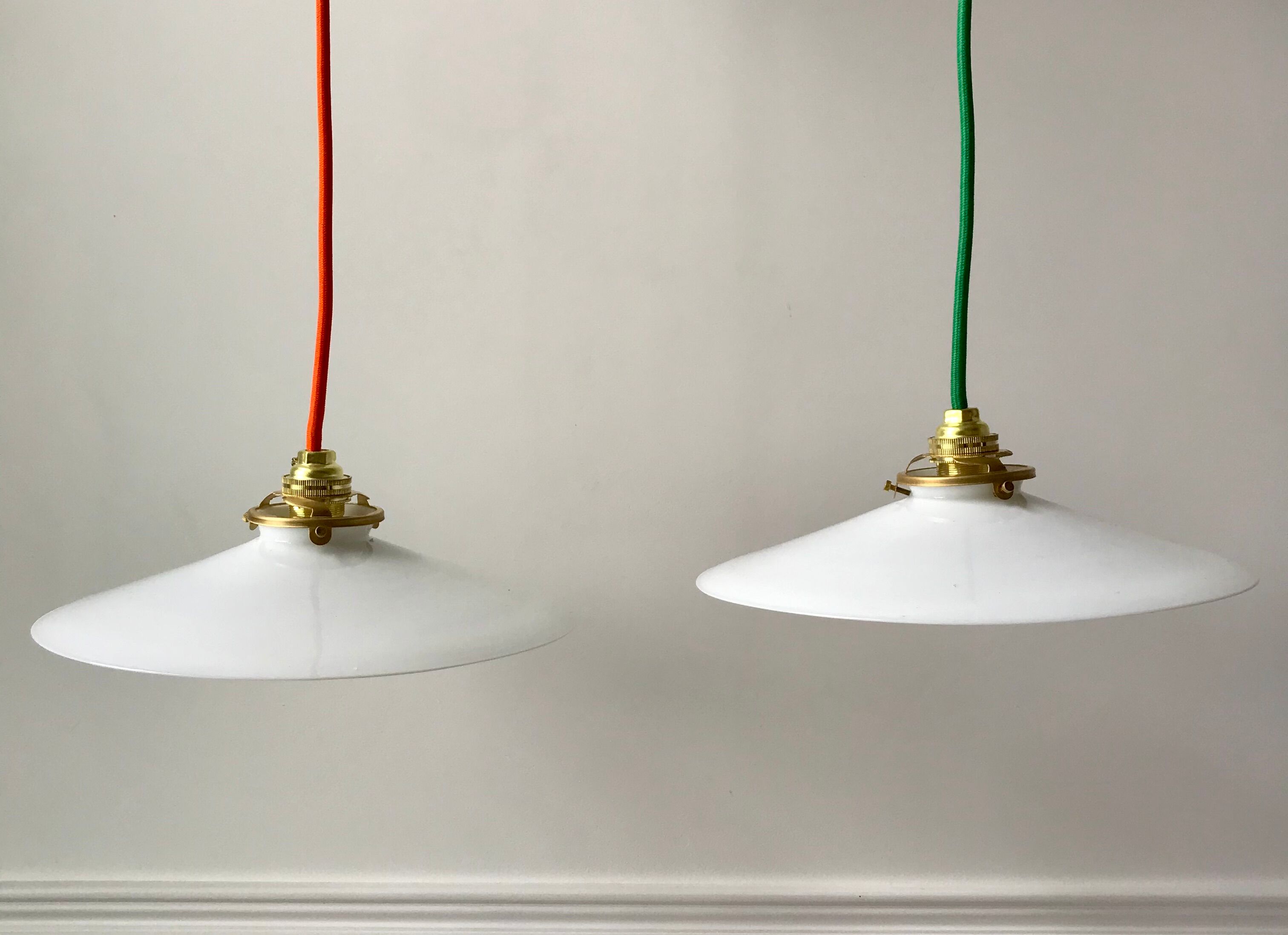 Pair of suspensions in smooth opaline colored thread early twentieth century