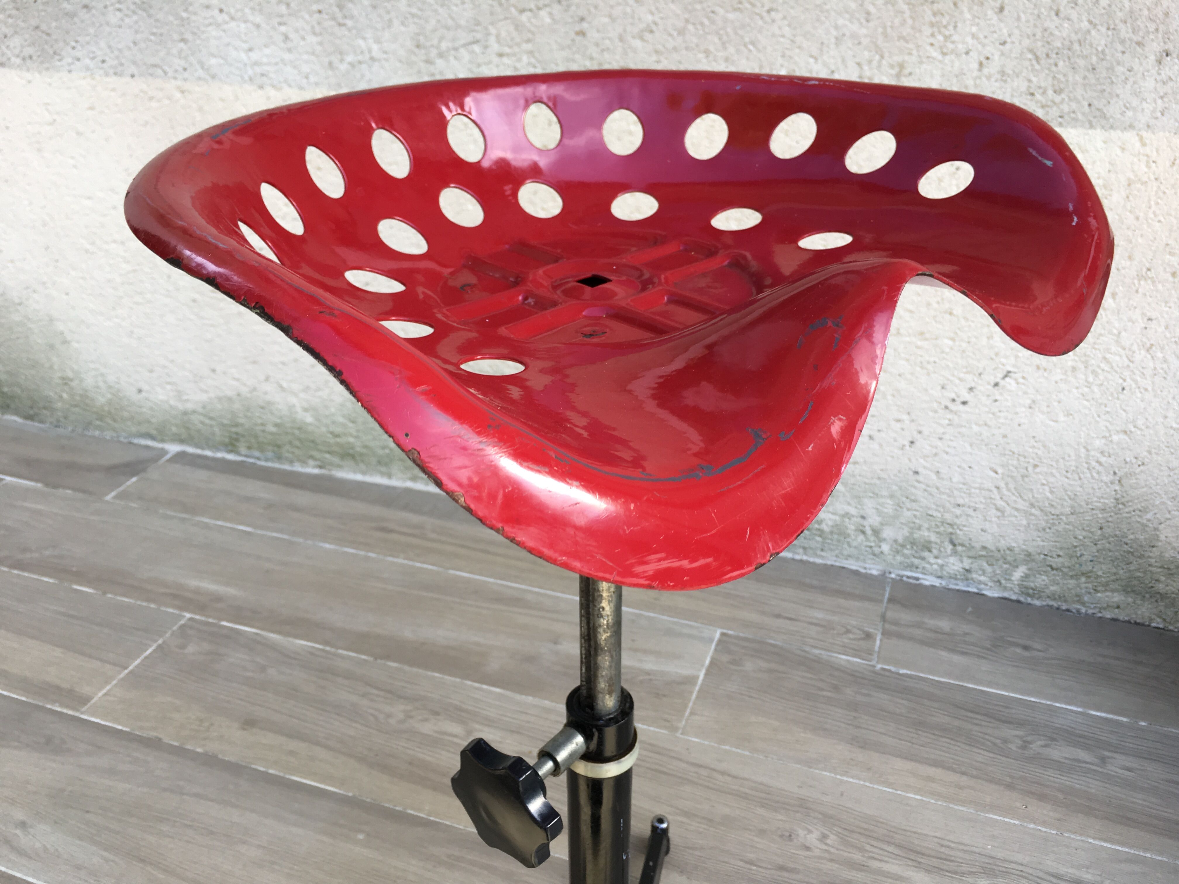 Vintage high stool sitting tractor