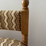 Pair of wooden chairs with herringbone fabric