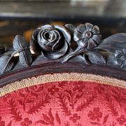 Napoleon III medallion armchair in carved wood and red velvet.