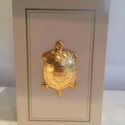 Pair of lamps decorated with golden turtles
