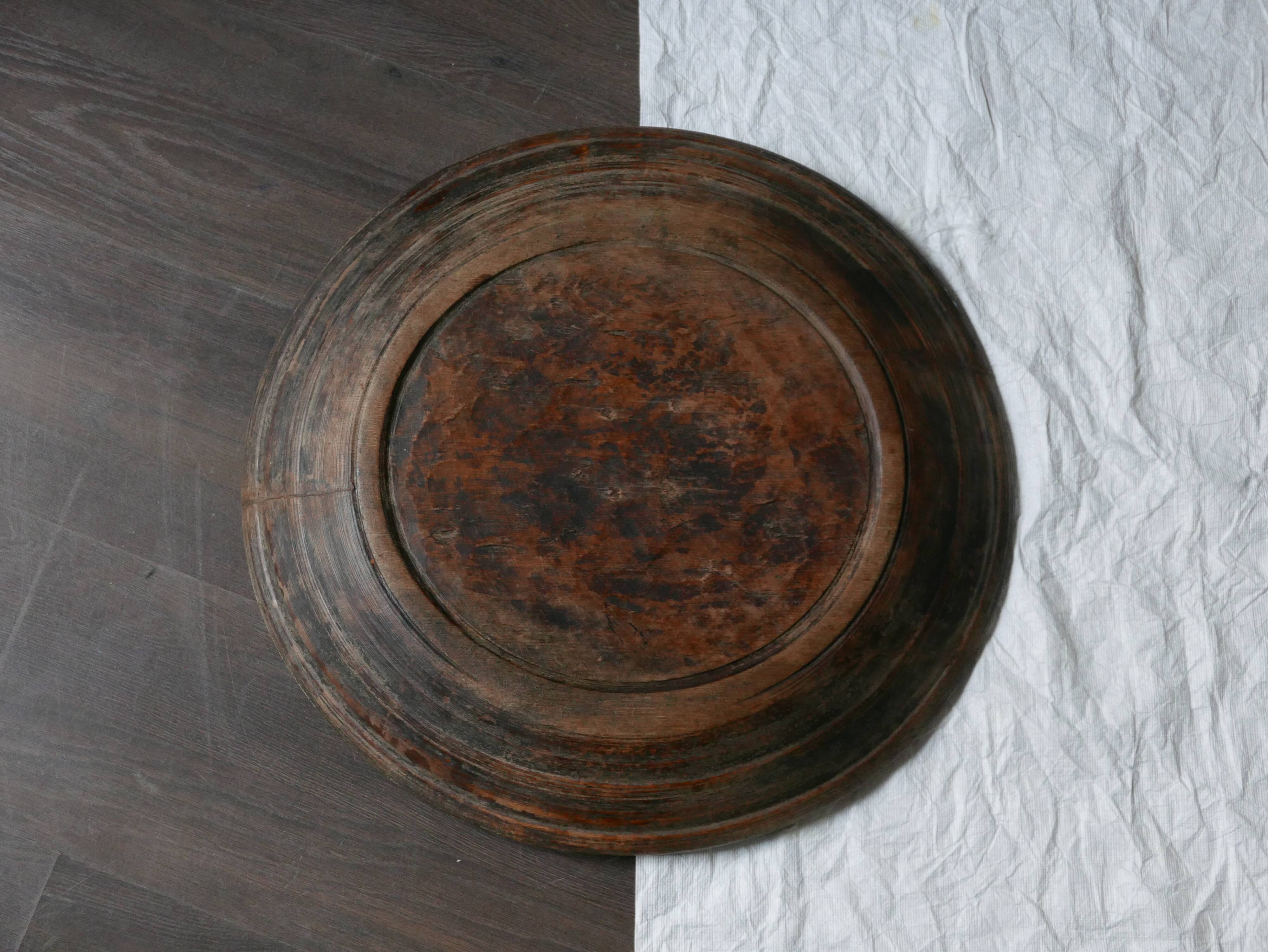 Old round wooden tray