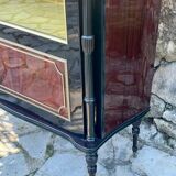Mahogany display case with gilded brass decoration