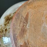 Cup pique flowers in sandstone signed