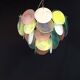 Handcrafted chandelier with Murano glass discs.