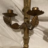 Pair of candle holders in wall, eagle pattern in gilded wood and brass