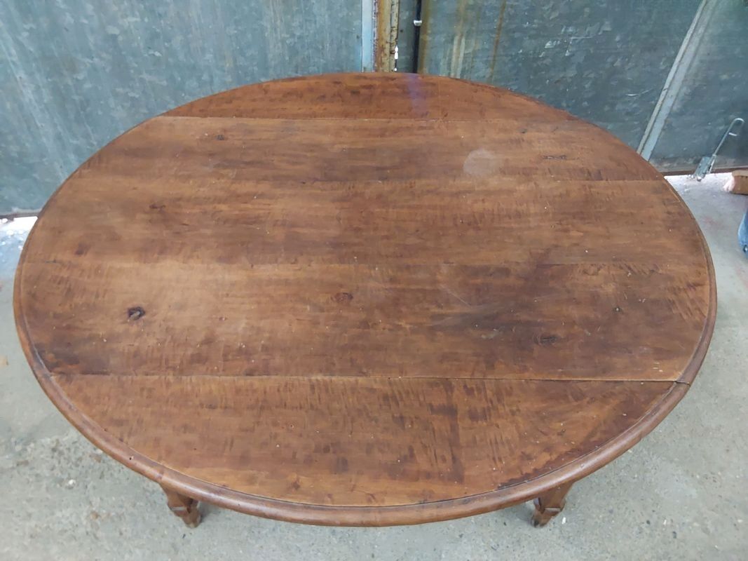 Antique wooden drop-leaf table
