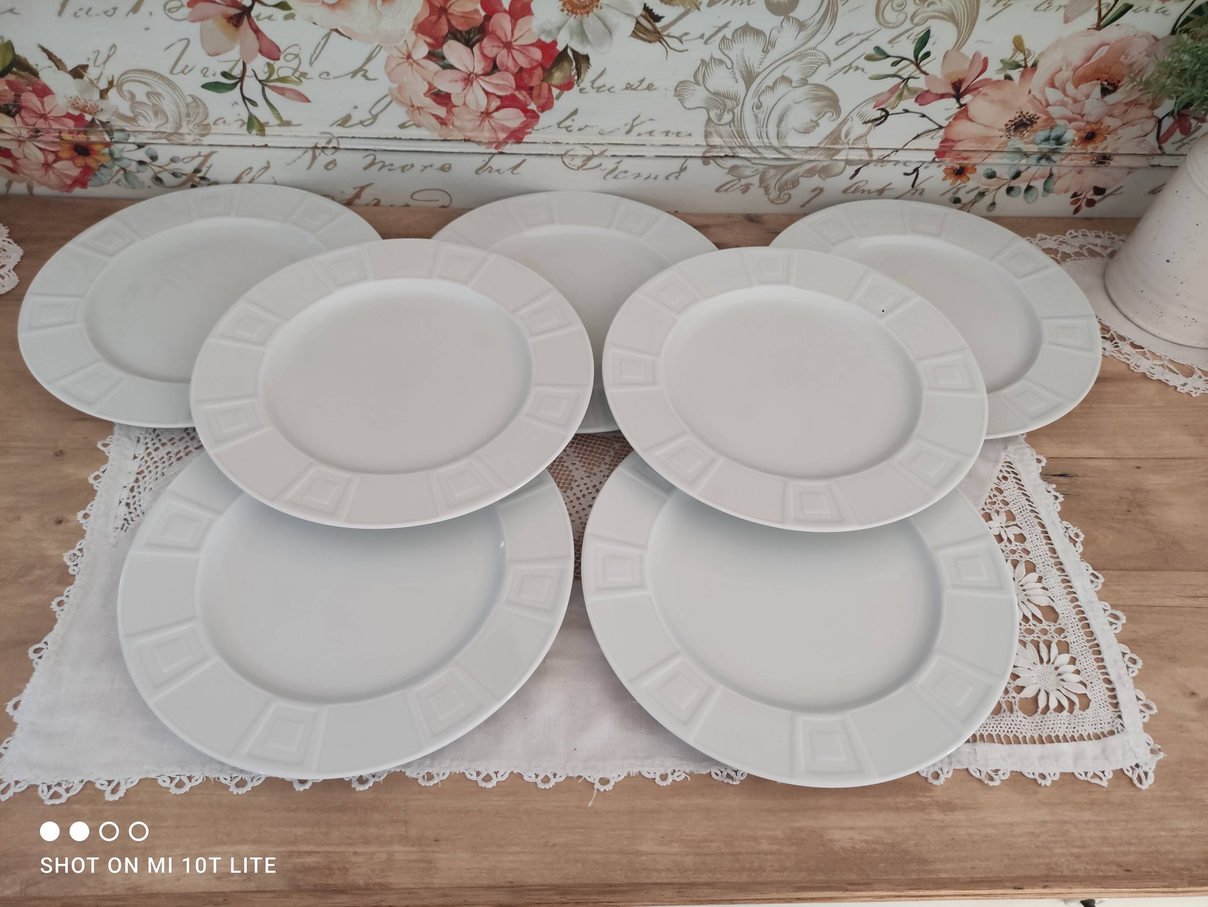 Set of 7 flat plates in white Limoges porcelain geometric decoration in relief