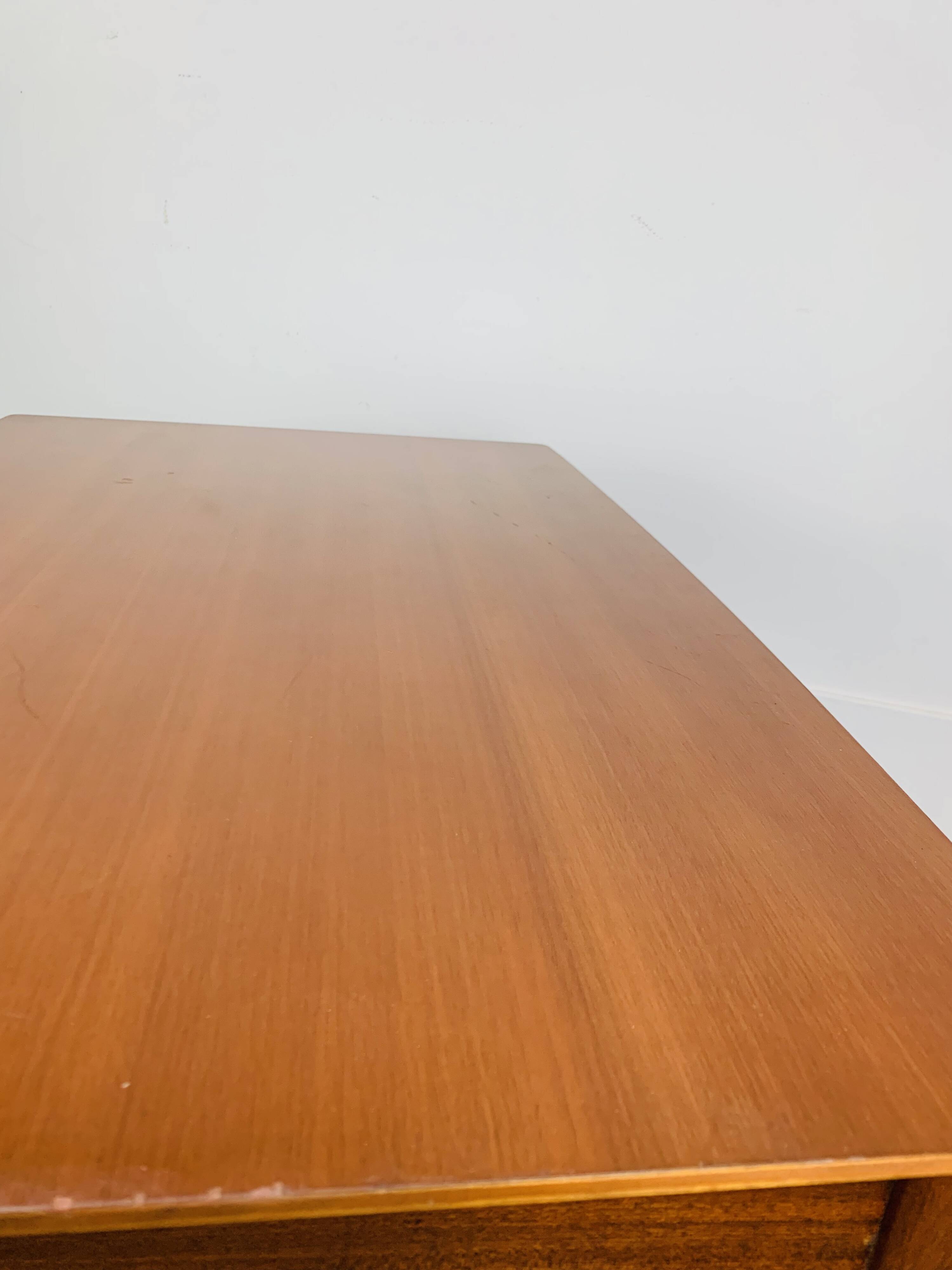 Minimalist Scandinavian teak desk from the 1960s, vintage.