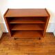 Vintage bookcase with metal feet