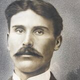 Authentic old photograph portrait of a handsome man with mustache 1920 - 1930