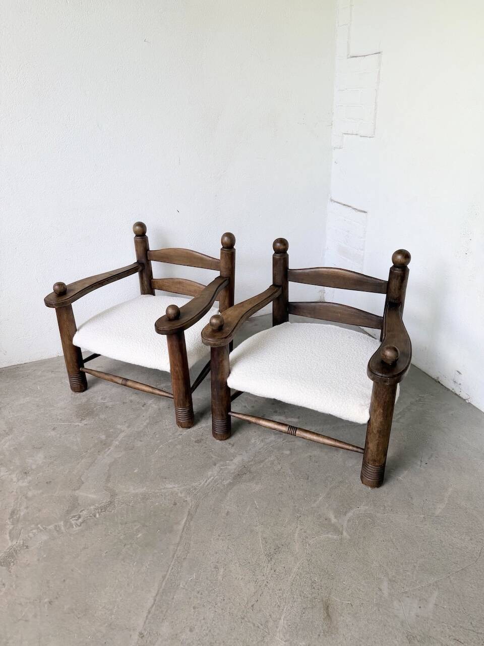 Pair of Dudouyt armchairs from the 1950s, oak.