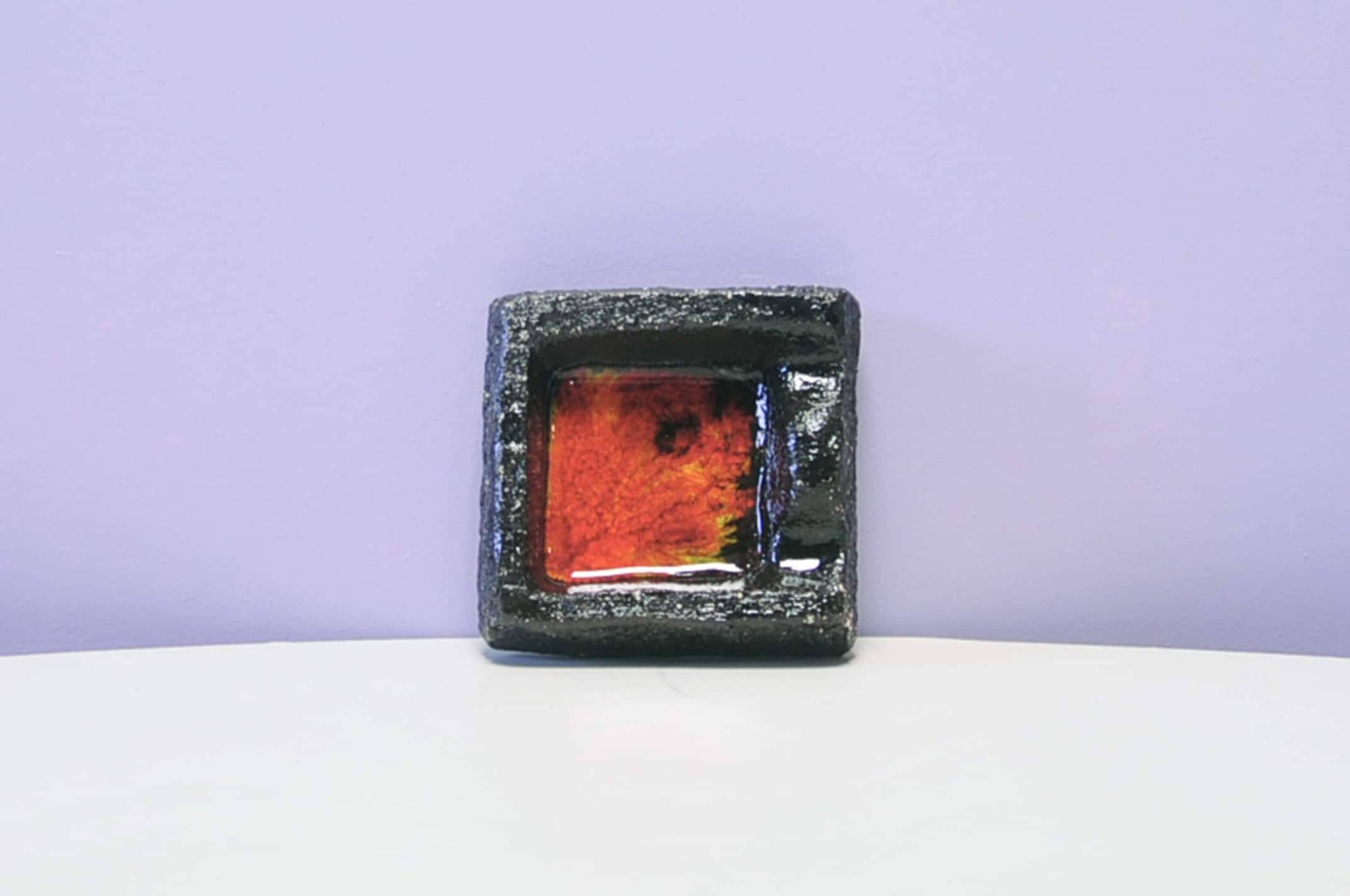Vintage coarse brown & red ashtray