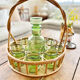 Service at orangeade vintage seventies green glass and rattan basket