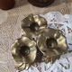 Brass flower candle holder