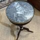 Mahogany gueridon with marble top from the 1950s.