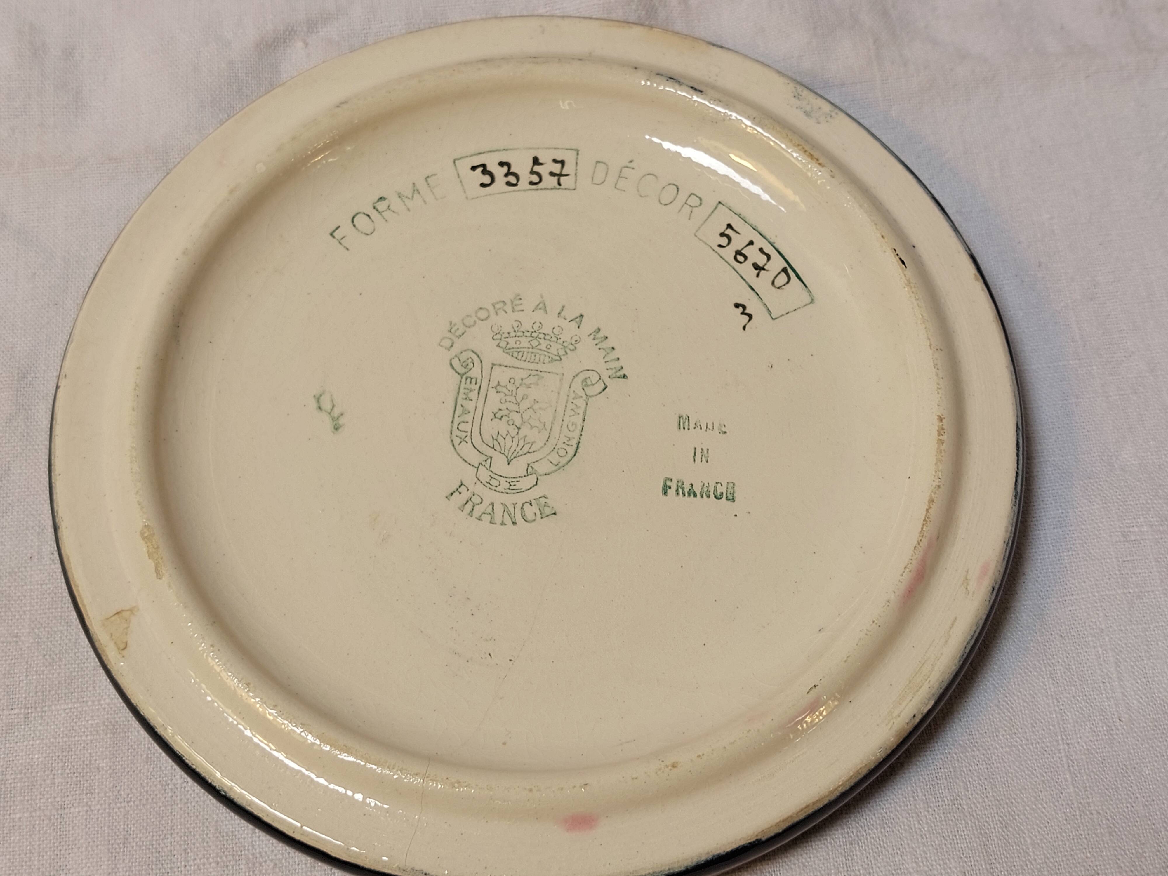 Ensemble émaux de Longwy dessous de plat et de bouteille décor floral