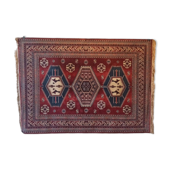 Wall rug with oriental patterns.