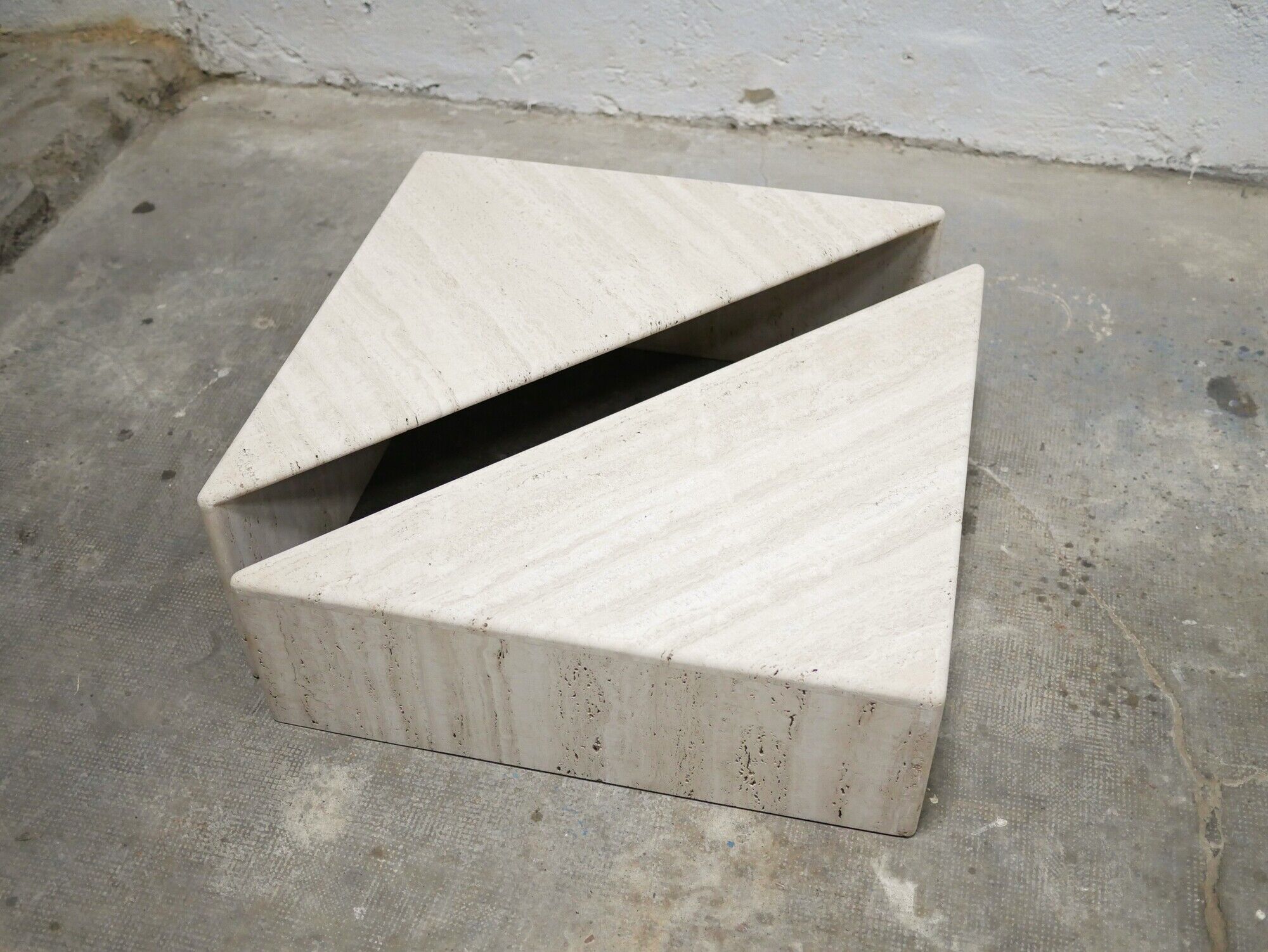 Series of 2 vintage travertine coffee tables published by Roche Bobois