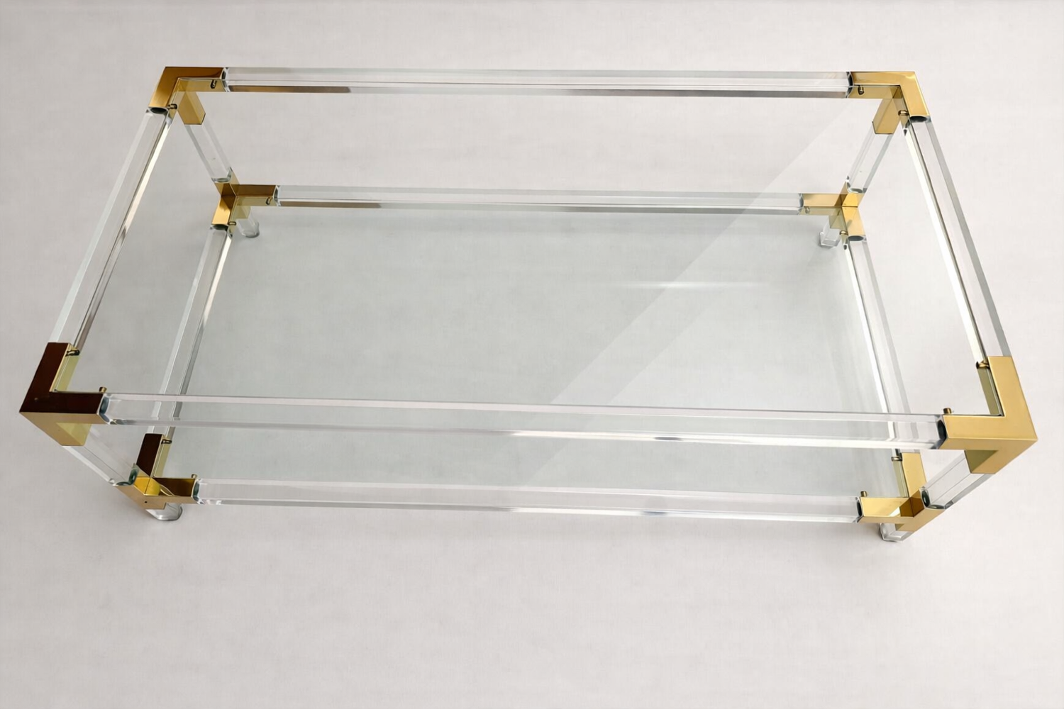 Italian coffee table Fabian, glass, plexiglass and brass, 1970-80.