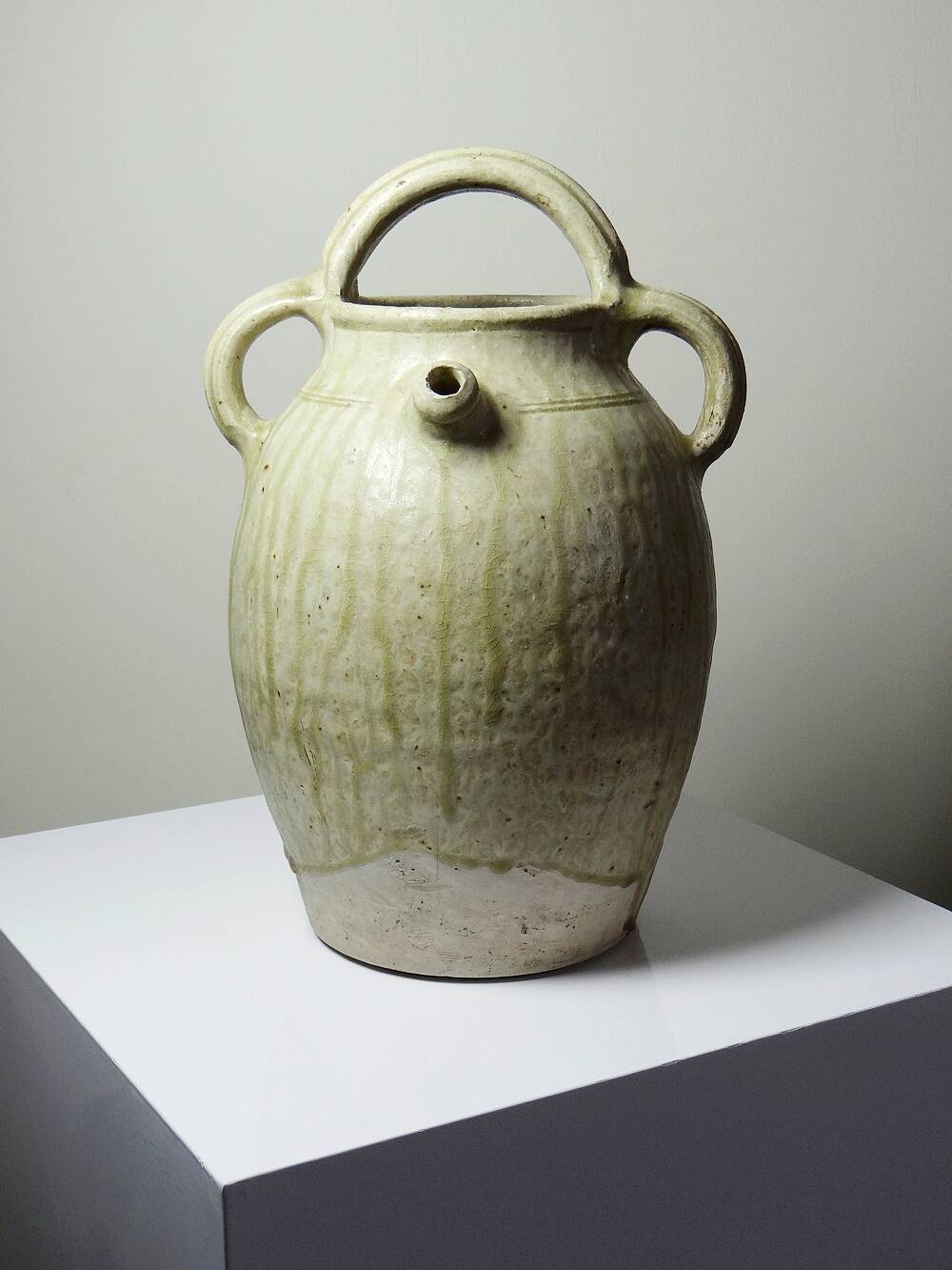 Green ash-glazed stoneware casserole from Puisaye, late 19th to early 20th century.