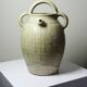 Green ash-glazed stoneware casserole from Puisaye, late 19th to early 20th century.