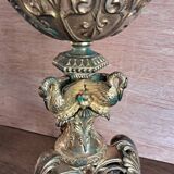 Gilded bronze candle holder with religious swans