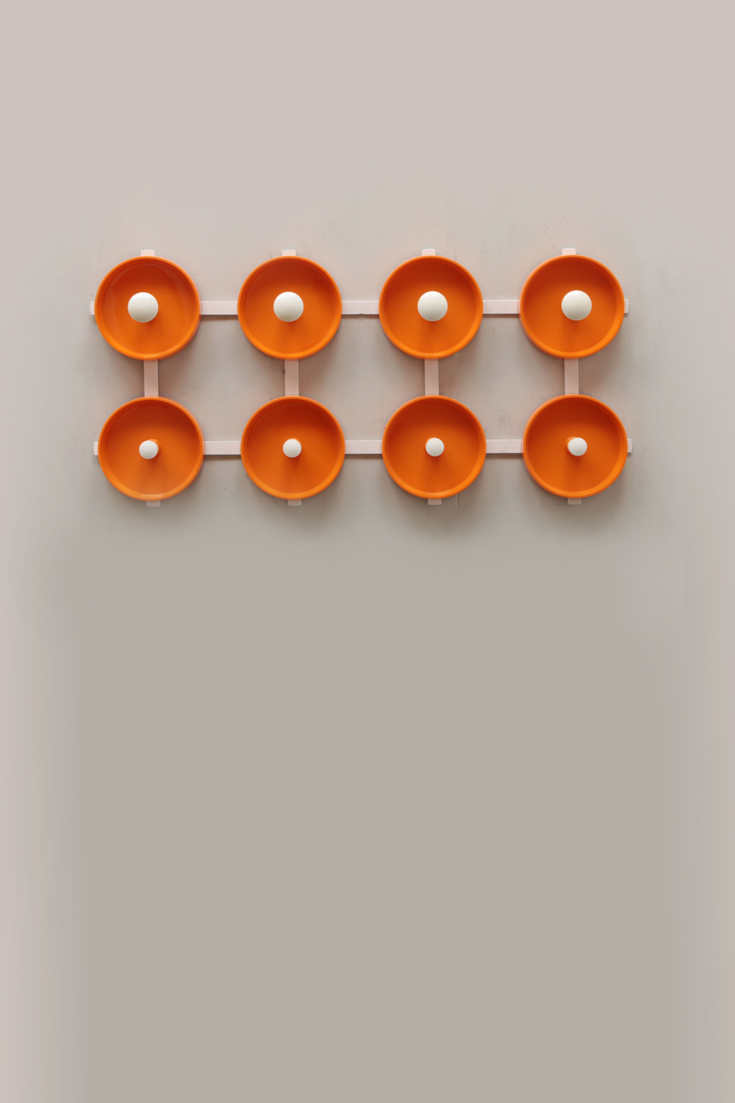 Orange spage age wall coat rack 1960s