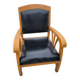 Teak and black faux leather armchair