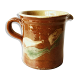 Old pitcher pot in glazed earth