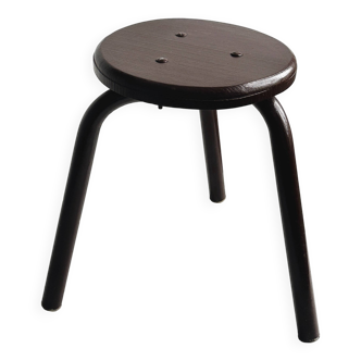 Dark brown metal stool, minimalist three-legged design