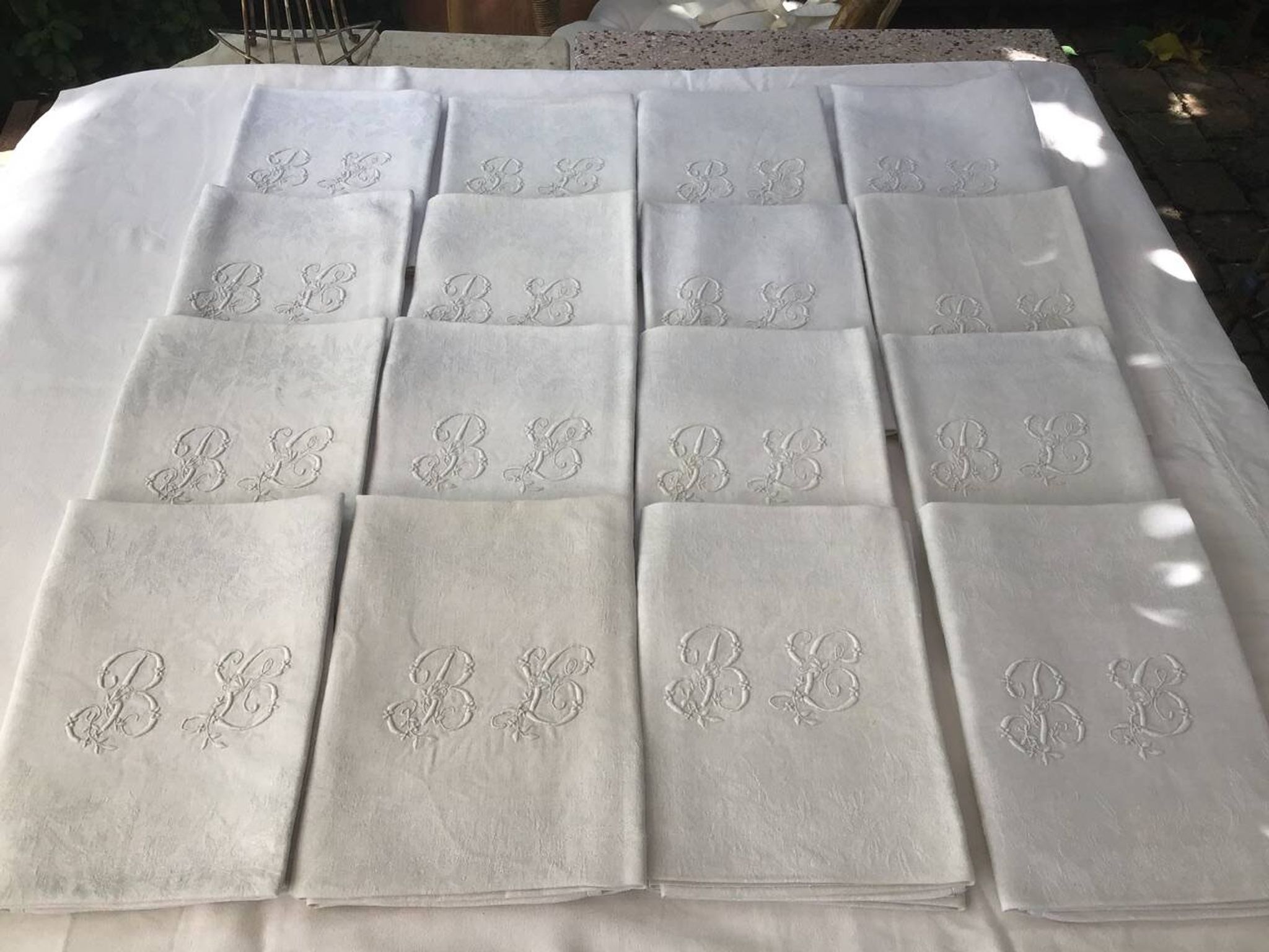Set of 12 19th century white napkins marked “BL”