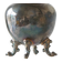 Neoclassical cup with a patinated and silvered copper base.