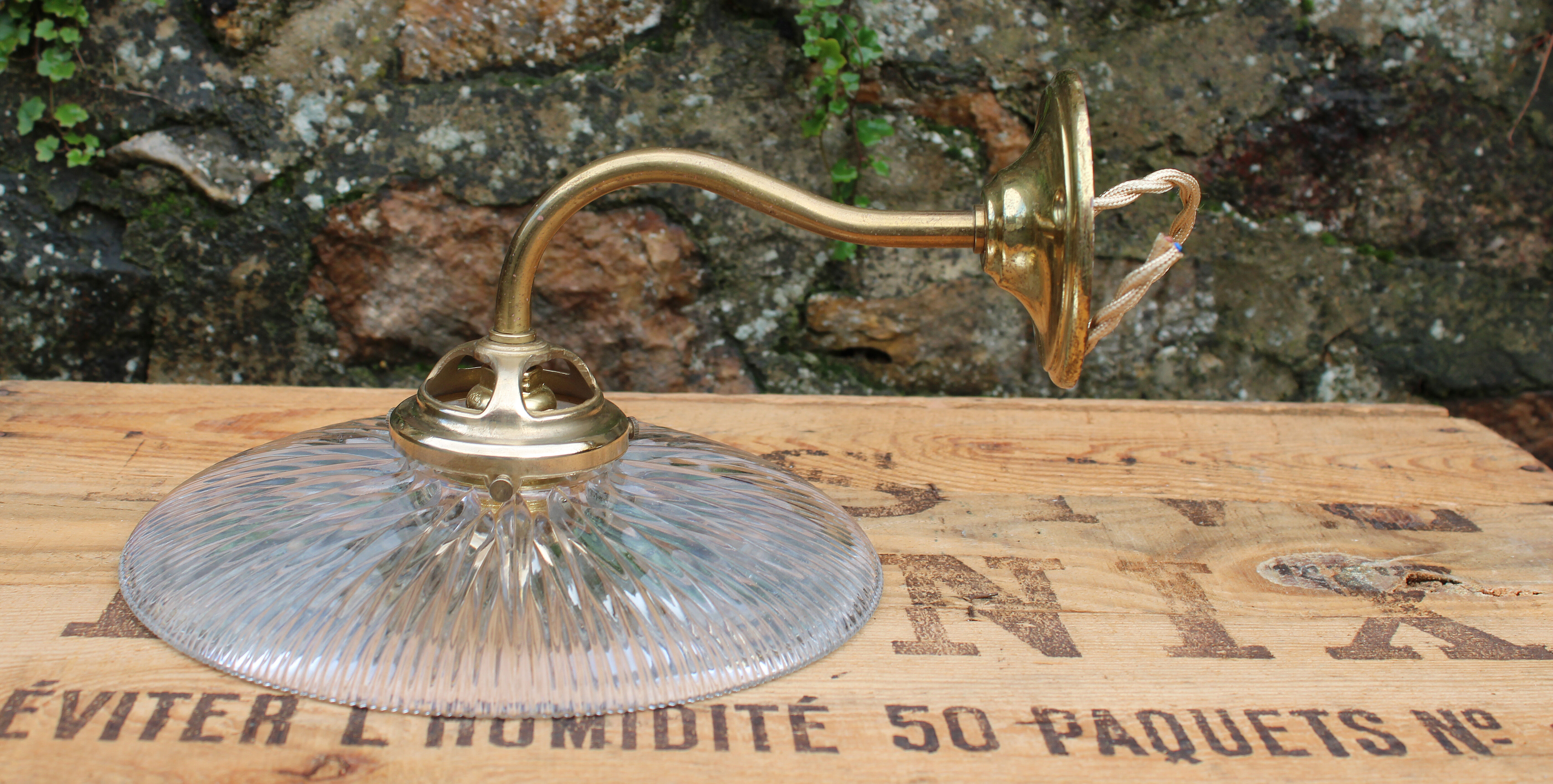 Holophane glass and brass wall light