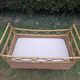 Vintage rattan baby cot