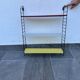 Tomado metal shelf