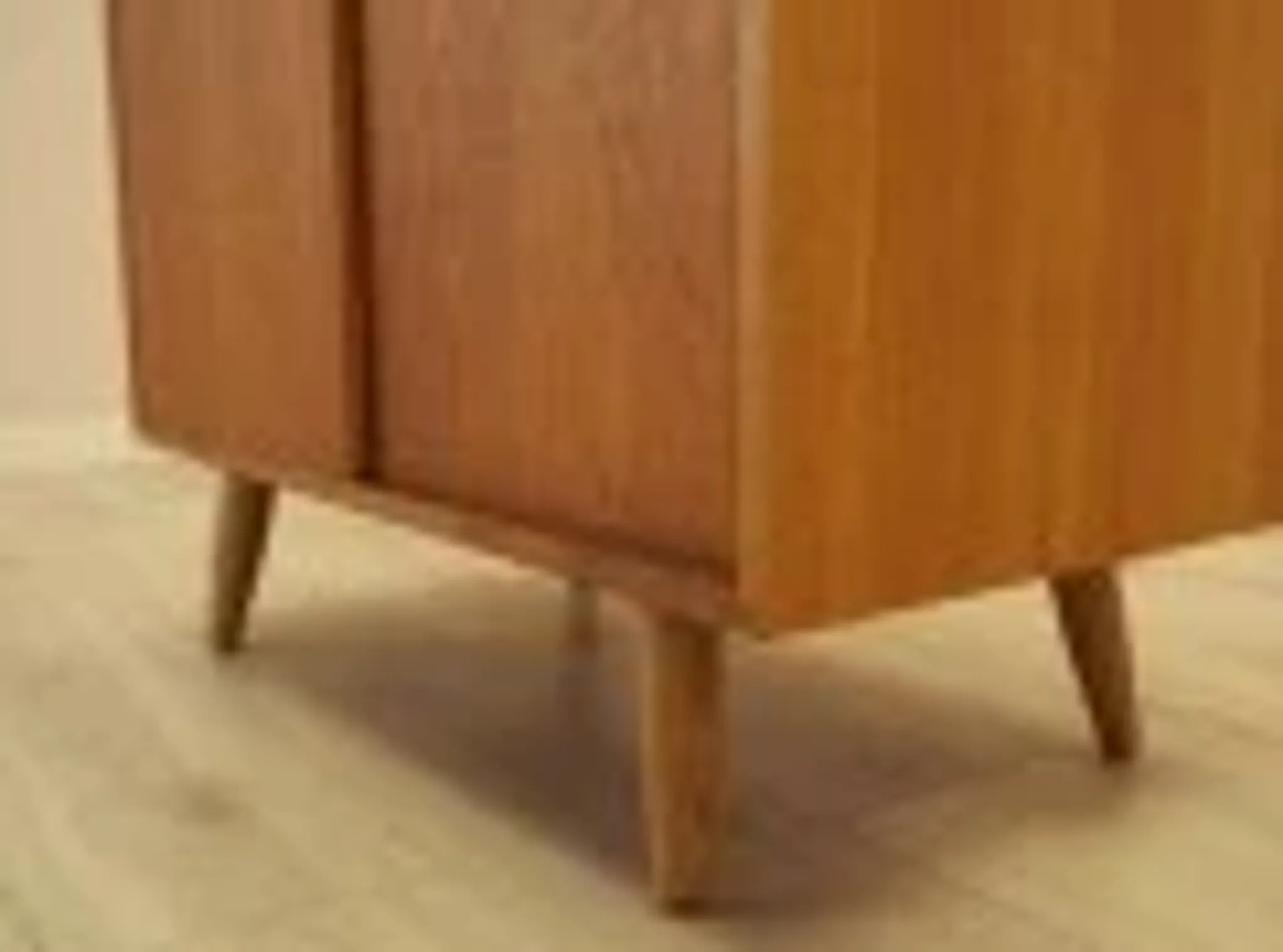 Ash cabinet with sliding doors by Hjørnebo, Danish, 1960s