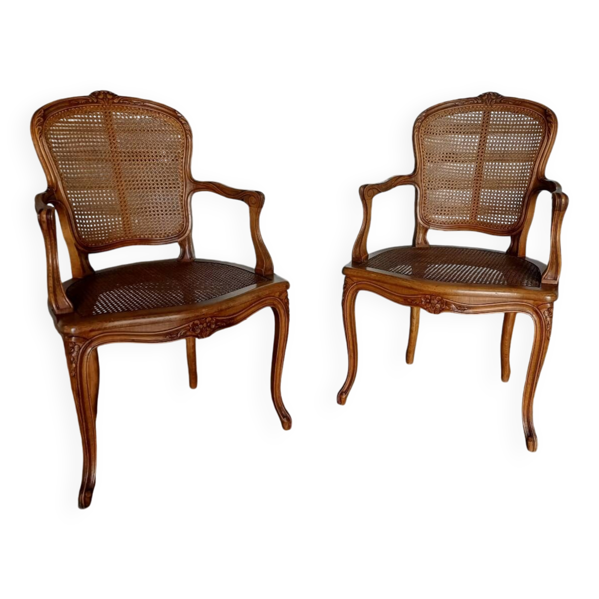 Pair of caned cabriolet armchairs