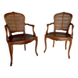 Paire de fauteuils cabriolets cannés