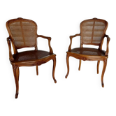 Pair of caned cabriolet armchairs