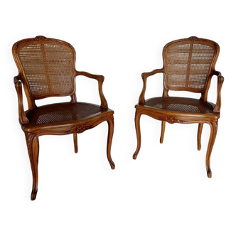 Pair of caned cabriolet armchairs