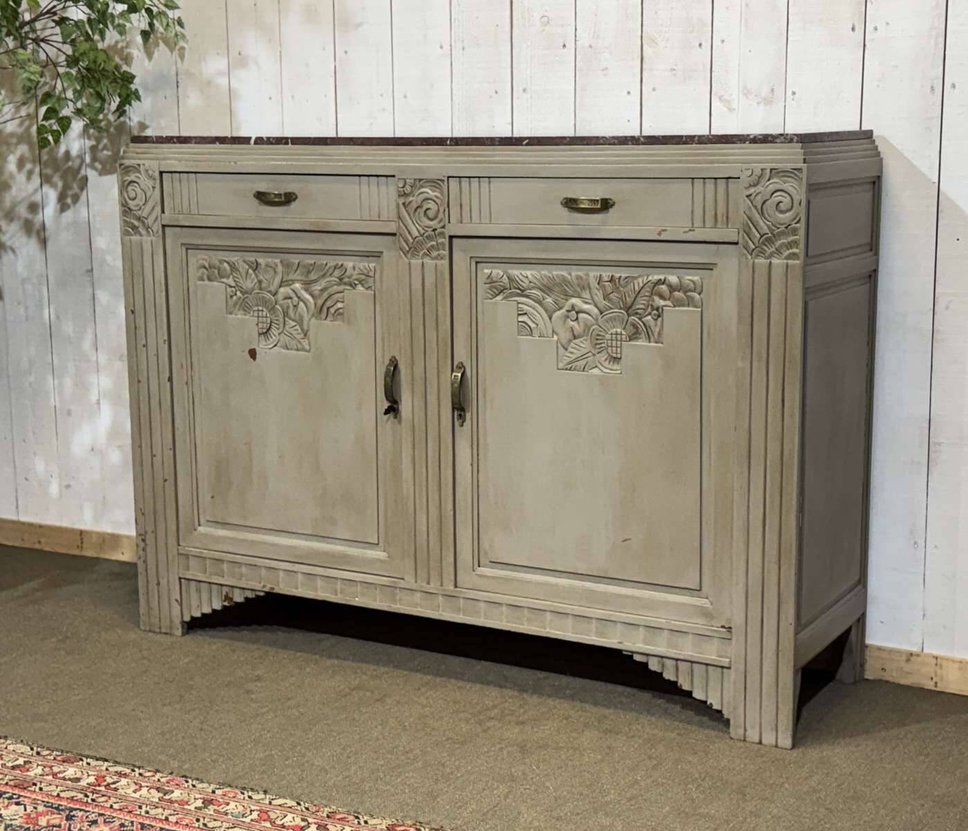 Art Deco sideboard in walnut, oak and marble top.