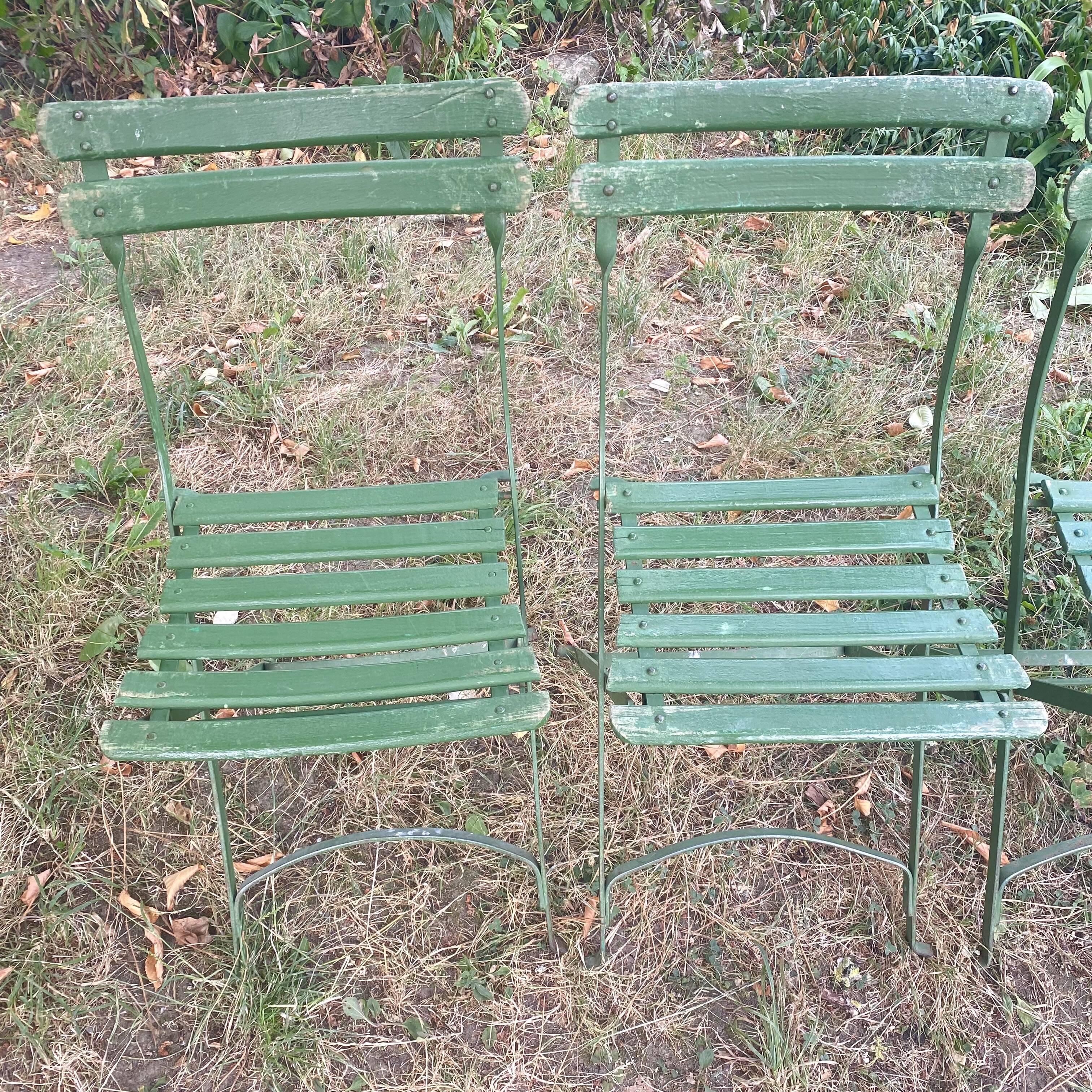 Antique folding garden chairs with wooden slats